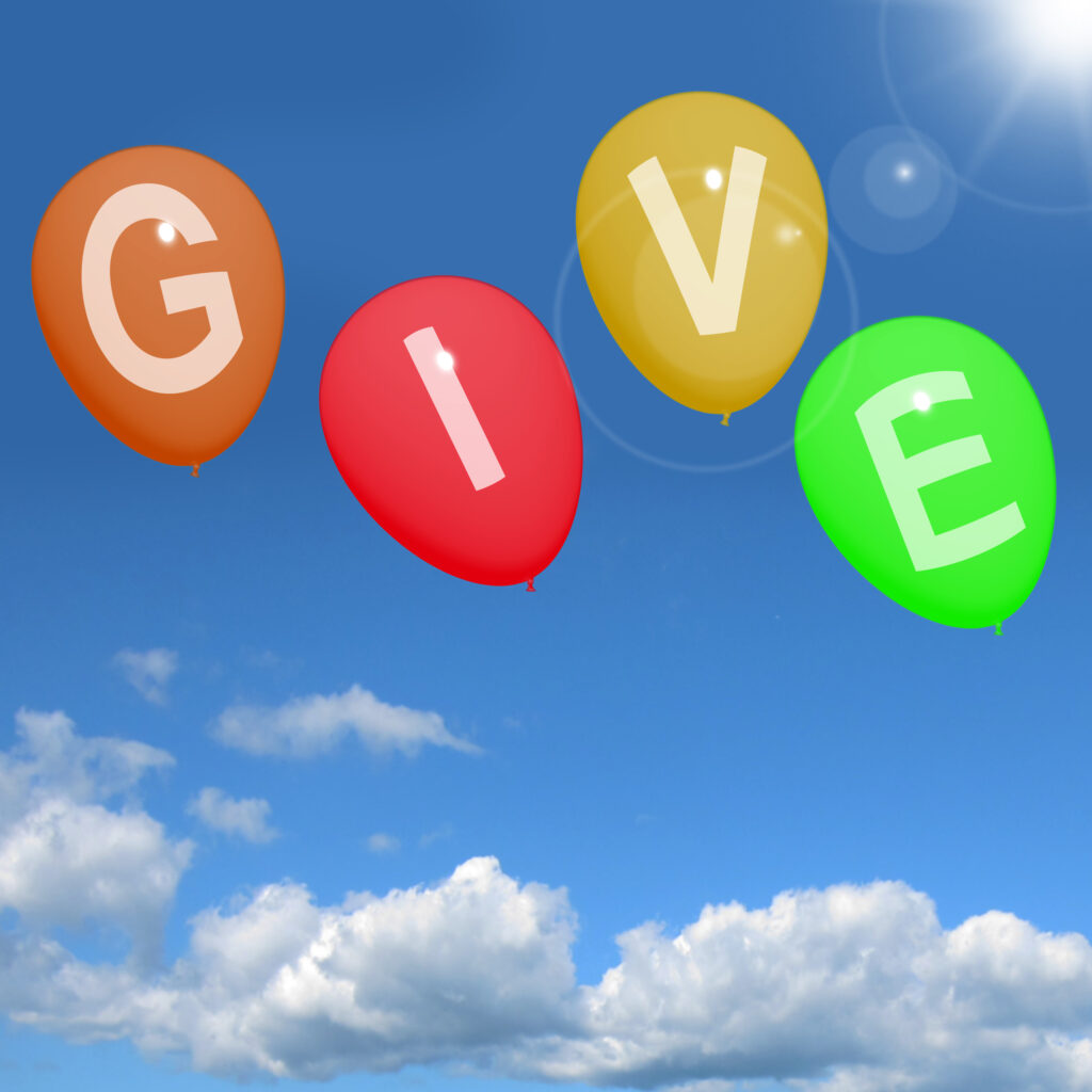 Give Word On Balloons Showing Charity Donations And Generous Assistance