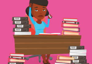 Stressed Woman Working In Office.