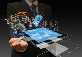 Technology In The Hand Of Businessmen