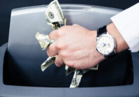 Businessman Hands Throwing Us Dollar Bills In Trash Bin