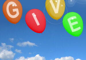 Give Word On Balloons Showing Charity Donations And Generous Assistance