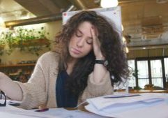 Tired Businesswoman In The Office With Stack Of Papers Sbi 350593568